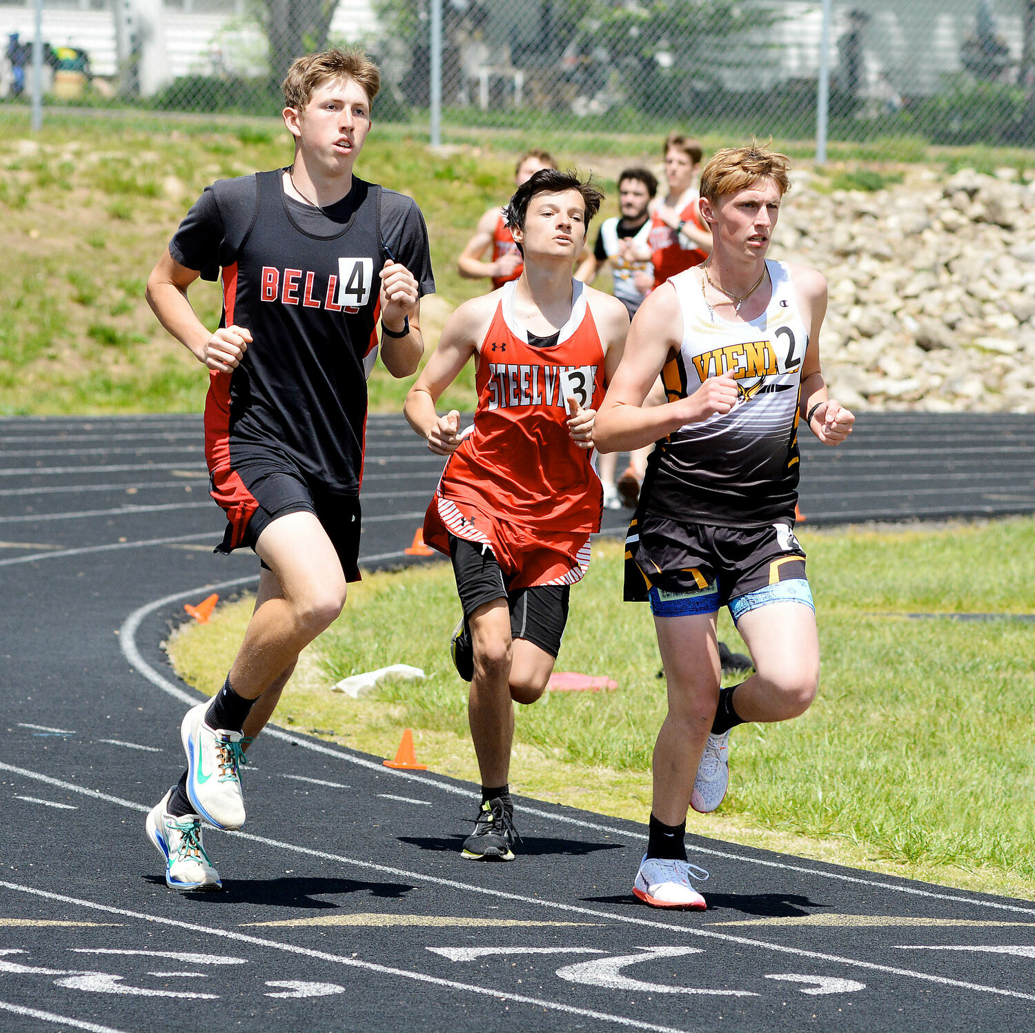 Baylar Smith (far left) and Cooper Auten (below, far right) represent Maries County in the boys 3200m run.